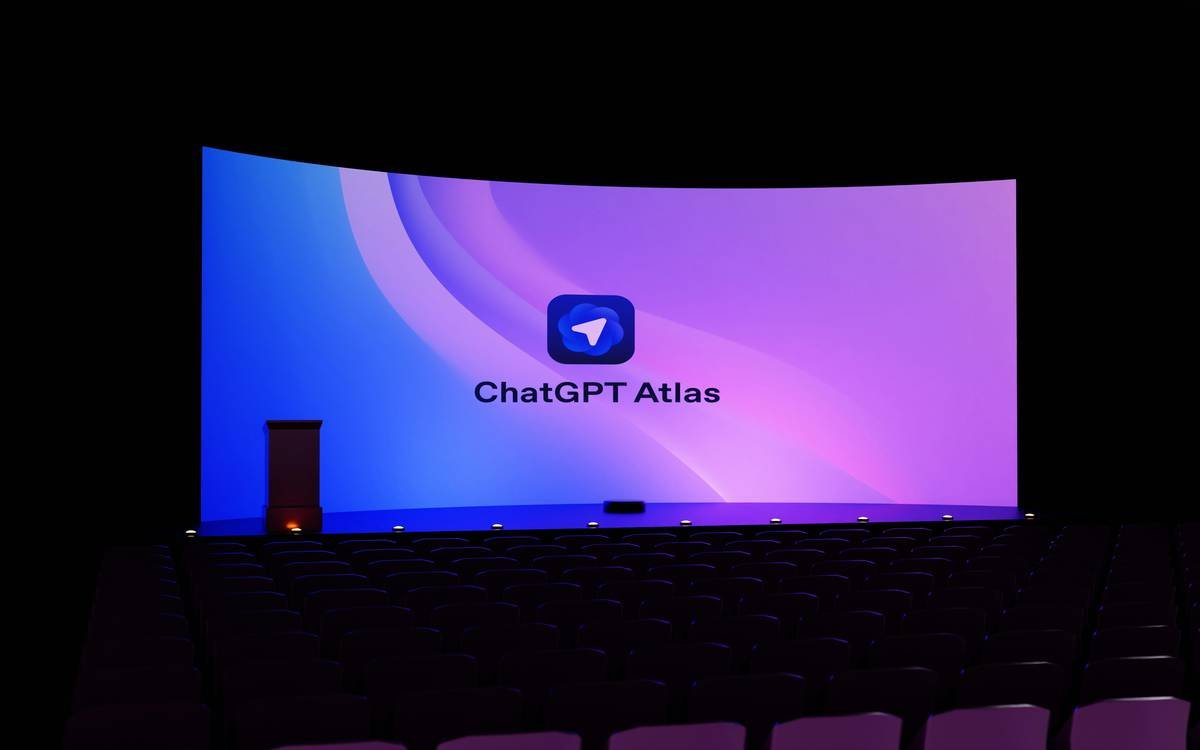 ChatGPT Atlas logo displayed on a massive cinema screen with vibrant purple and blue gradient background. The sleek presentation features the iconic messenger-style icon in a movie theater setting with rows of purple seats. Perfect representation of AI technology, digital innovation, and modern presentation design showcasing artificial intelligence branding in an immersive entertainment environment.